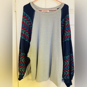 We The Free Crewneck Sweater in Gray with Navy, Red & Green Sleeve Pattern
